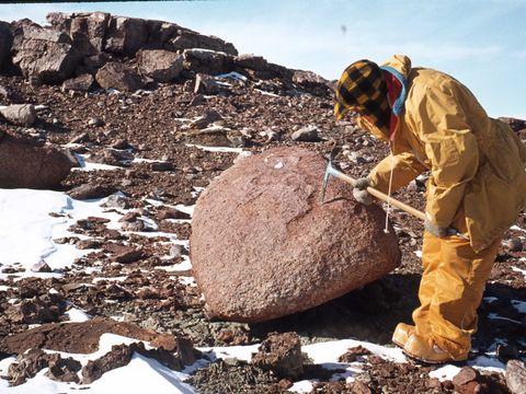 1978-40-G-Claridge-examining-a-granite-boulder-erratic-on-Mt-Ash.jpg