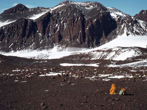 1978-91-G-Claridge-sampling-an-old-soil-in-high-basin-at-east-end-of-Turnstile-Ridge-area.jpg
