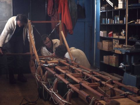 1978-11-Sledge-repairs-in-Scott-Base-sledge-room-unknown-people.jpg