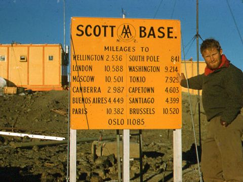 1958-Jim-Wilson-at-Scott-Base-sign.jpg