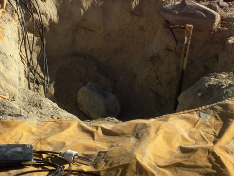 1999-099-Dry-frozen-soil-pit-for-installing-soil-climate-monitoring-equipment-at-Bull-Pass.jpg