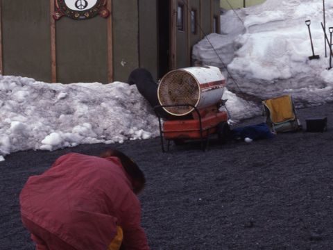 1991-310-G-Claridge-sampling-a-fuel-spill-site-at-World-Park-base.jpg