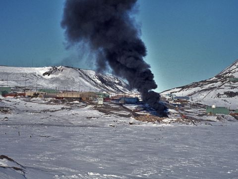 1977-030-Burning-rubbish-on-the-foreshore-at-McMurdo-Station.jpg