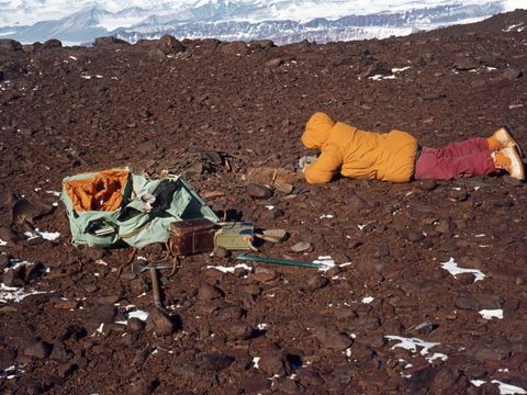 1978-78-I-Campbell-describing-a-soil-near-Pk-2421-in-very-windy-conditions.jpg