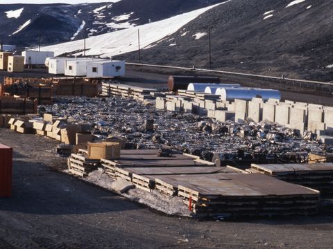 1991-255-Stored-material-at-The-Gap-near-McMurdo-Station.jpg