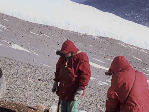 1977-150-D-Cowie-B-Miller-inspecting-an-old-soil-pit-near-the-Meserve-Glacier.jpg